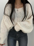 Kukombo Cutout Lantern Sleeve Baggy Sweater