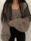 Kukombo Cutout Lantern Sleeve Baggy Sweater