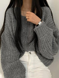 Kukombo Cutout Lantern Sleeve Baggy Sweater