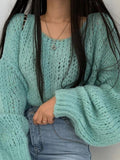 Kukombo Cutout Lantern Sleeve Baggy Sweater