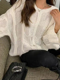 Kukombo Solid Cutout Loose Knit Sweater