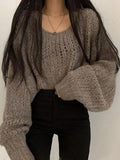 Kukombo Cutout Lantern Sleeve Baggy Sweater