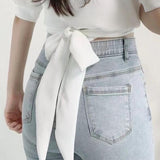 Kukombo discover style ideas Chic Summer French Style Niche Design Cross V-neck Lace-up Waist Short White Shirt Top for Women