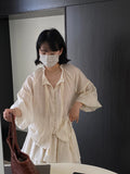 Kukombo Naiguai suit Heavy accordion pleated wood ear edge lantern sleeve shirt + double layer short skirt pants female 1085