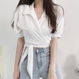 Kukombo discover style ideas Chic Summer French Style Niche Design Cross V-neck Lace-up Waist Short White Shirt Top for Women