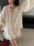 Kukombo Naiguai suit Heavy accordion pleated wood ear edge lantern sleeve shirt + double layer short skirt pants female 1085