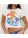 Kukombo Women Graphic Baby Tees Y2k E Girls Short Sleeve Floral Printed Crop Tops Slim Fitted Aesthetic Summer Shirts Vintage Streetwear