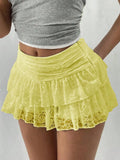 Kukombo Women Y2k Lace Mini Skirt Sexy Leopard Tiered Flowy Ruffle Half Slip Skirt Low Rise Layered Pleated Short Skirt Underskirt
