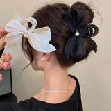 Kukombo French Elegant Pearl Bow Claw Clip Women's Summer Elegance and High Grade Feeling Back Head Spoon Pan Hair Shark Clip Headpiece