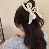 Kukombo French Elegant Pearl Bow Claw Clip Women's Summer Elegance and High Grade Feeling Back Head Spoon Pan Hair Shark Clip Headpiece