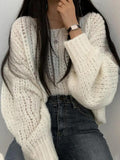 Kukombo Cutout Lantern Sleeve Baggy Sweater