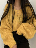 Kukombo Cutout Lantern Sleeve Baggy Sweater
