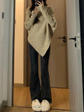 Kukombo High Neck Irregular Hem Sweater
