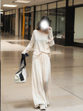 Kukombo Apricot Two-piece Suit Women's Spring And Summer 2024 New Long-sleeved Shoulder T-shirt Top High Waist Half-length Skirt