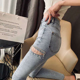 Kukombo  2022 New fashion Spring Summer Fashion Streetwear Thigh Cut Diamonds Tassel Skinny Jeans Women Denim Pants KZ566