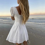 Kukombo White lace embriodery summer beach dress women elegant hollow out lace up short dress off shoulder puff sleeve sheer dress 2022