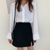 Kukombo  2022 Korean Version Of The Black Split Skirt Loose High Waist Thin Student Solid Bag Hip A-line Short Skirt Casual Preppy Style