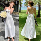 Kukombo 2022 Spring Summer Sexy Backless Waist Bow French Long White Suspender Dress V Neck Beach Style Satin Dress Vacation Style Dress