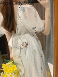 Kukombo 2022 Spring Fairy Vintage Dress Women Bow Sexy Backless Elegant Korean Dress Female Causal Puff Sleeve Sweet Design Party Dress