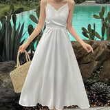Kukombo 2022 Spring Summer Sexy Backless Waist Bow French Long White Suspender Dress V Neck Beach Style Satin Dress Vacation Style Dress