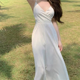 Kukombo 2022 Spring Summer Sexy Backless Waist Bow French Long White Suspender Dress V Neck Beach Style Satin Dress Vacation Style Dress